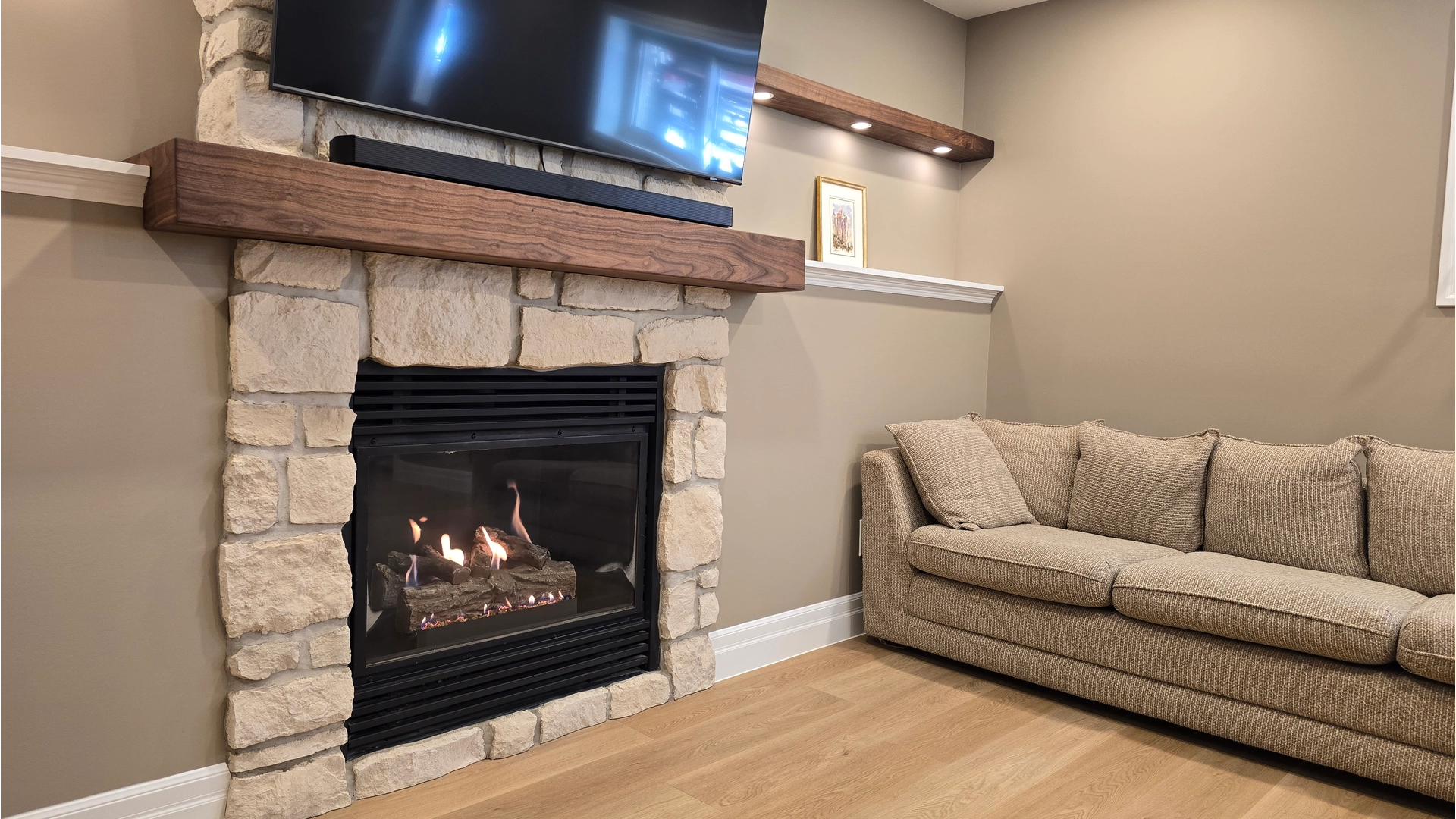Custom stone fireplace with walnut mantel